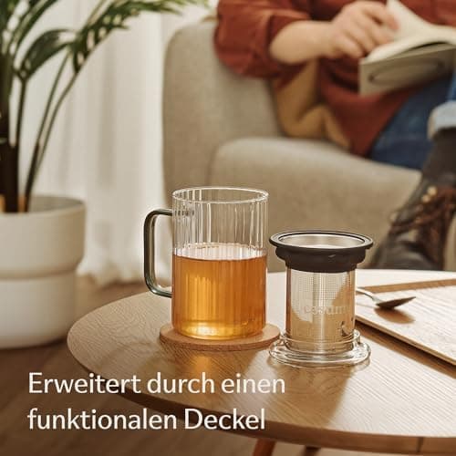 Cosumy Hitzebeständige Teetasse 450ml Schwarz - Farbgriff aus Borosilikat Glas mit Korkuntersetzer und Edelstahlfilter